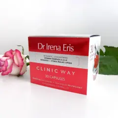 Dr Irena Eris Clinic Way dermokapsułki rewitalizujące. Pudełko z kosmetykiem i różowa róża.